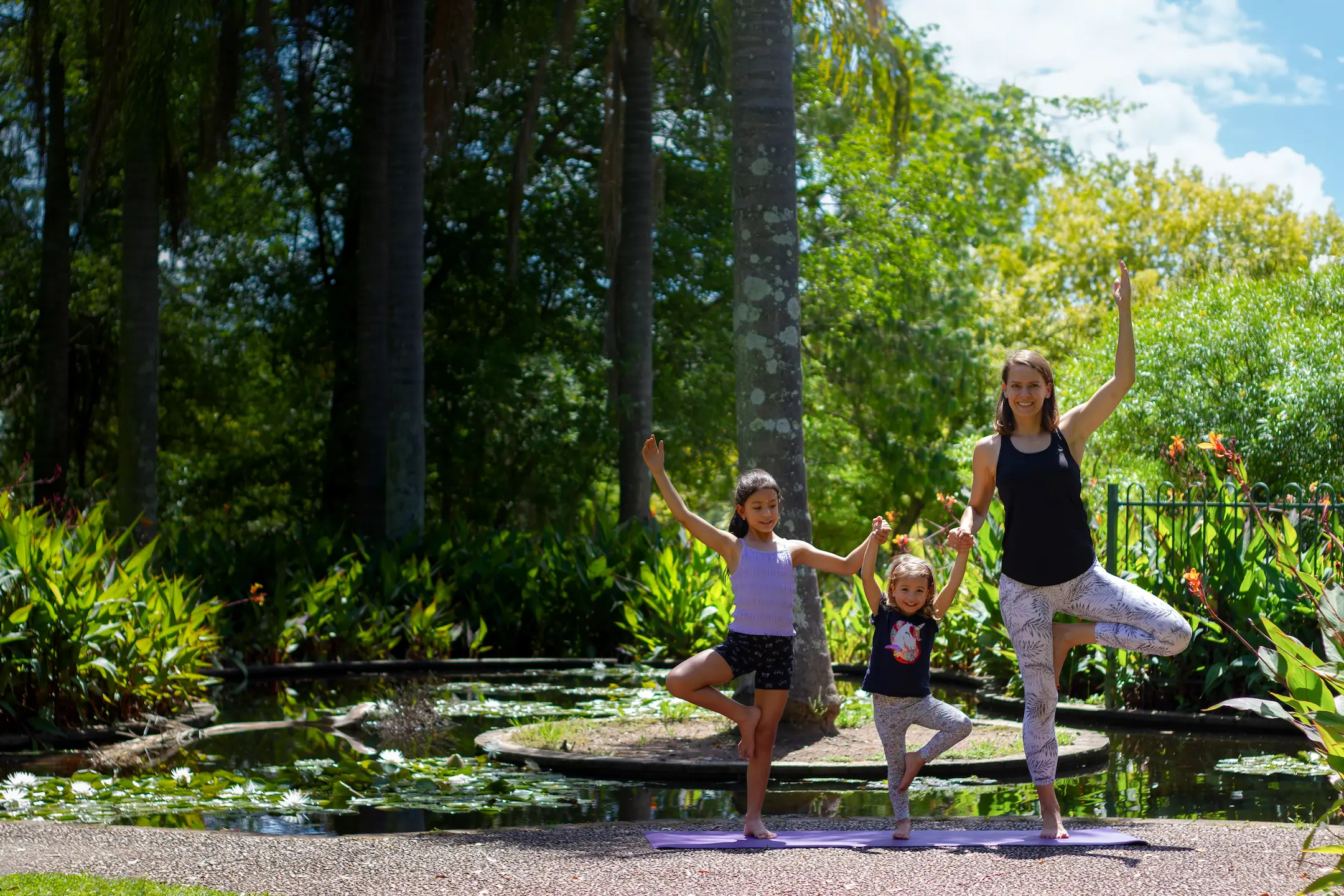 Image of children and their yoga teacher